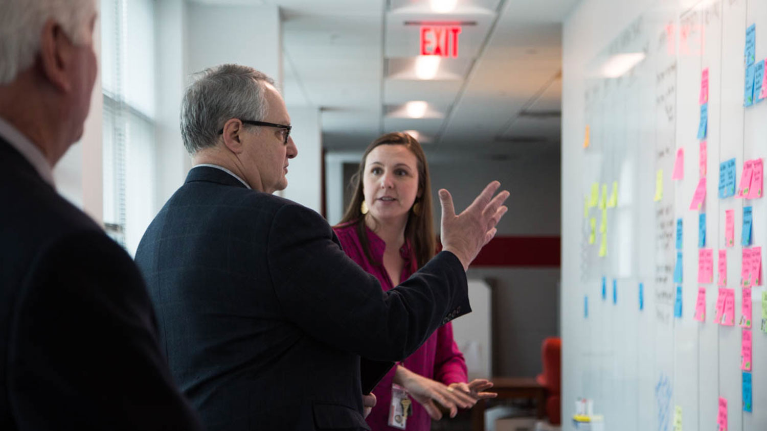 Photo of Merranie Zellweger discussing project coordination with Provost Arden