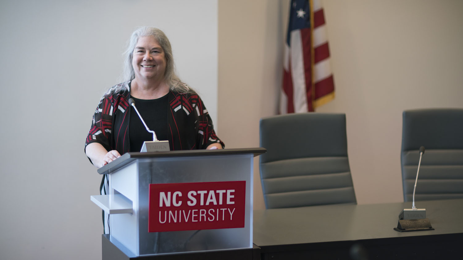 Photo of Cathi Phillips Dunnagan at the podium.