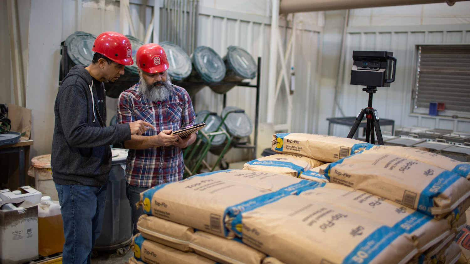 Mike Cuales (left) and Arthur Earnest (right) examine the Matterport virtual scans.