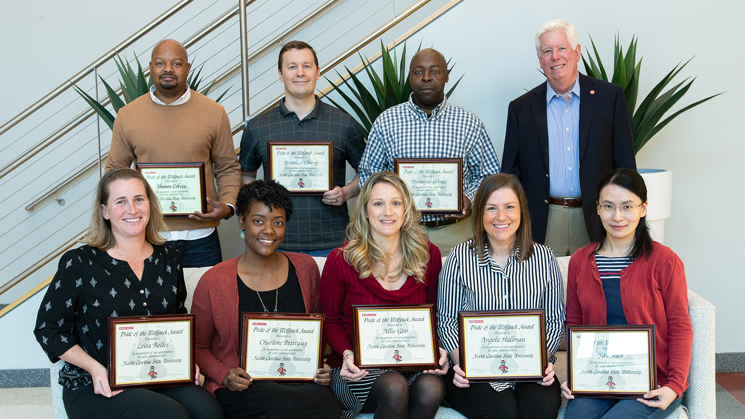 2018 Pride of the Wolfpack Recipients pictured with Senior Vice Provost Tom Miller. Back row left to right: Shawn Colvin, Jonathan Champ, Tremayne Grimes and Tom Miller. Front row left to right: Leisa Bolles, Charlene Pettiway, Allie Giro, Angela Hallman and Yan Shen.