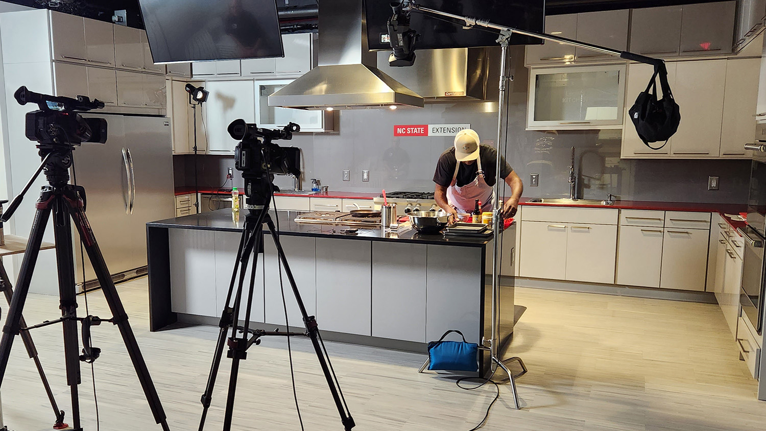 DELTA's Instructional Media Production team filming Cooking with North Carolina Seafood Video Series in the NC State Seafood Laboratory.