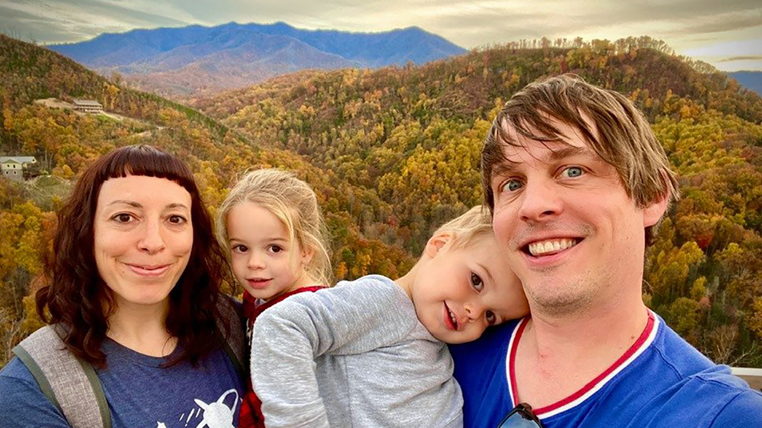 Laura Buker and her family posed in front of the Great Smoky Mountains