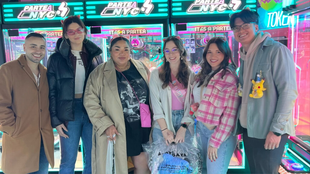 A group of people in an arcade