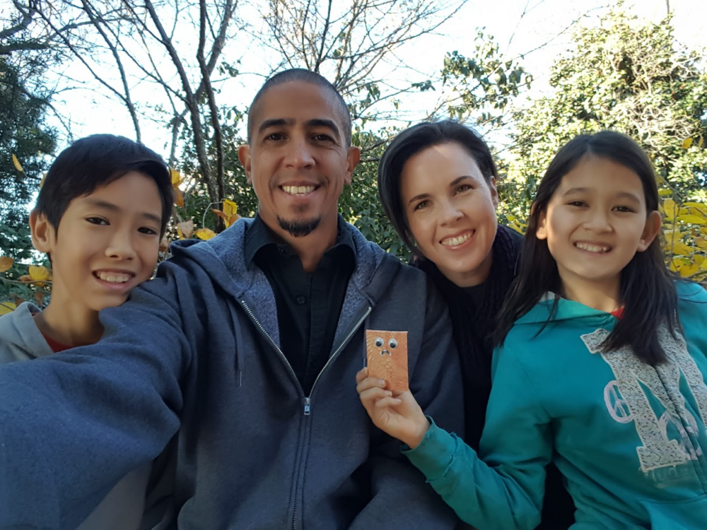 A family photo taken outdoors