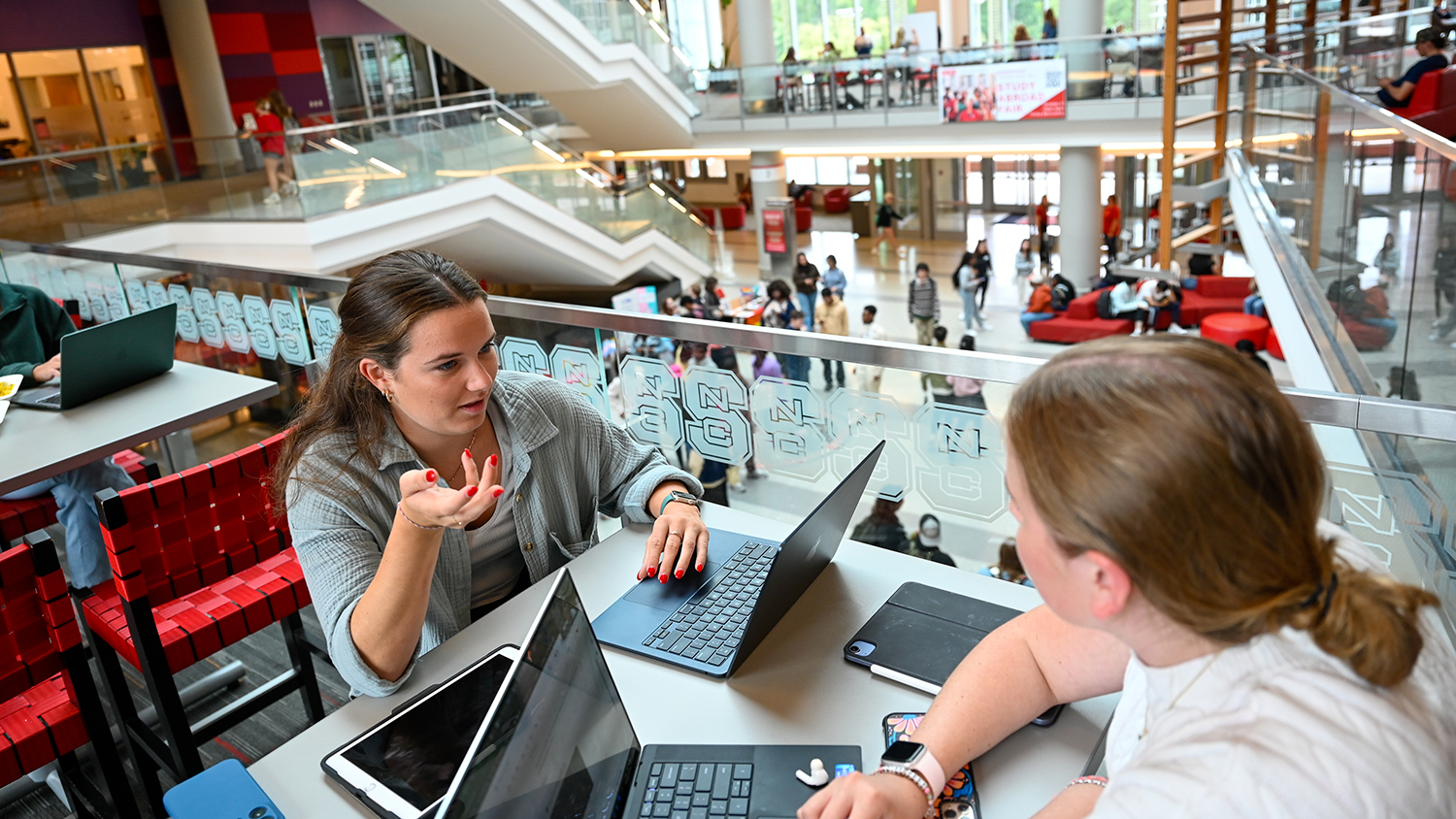 Students make their way through, and study in the Talley Student Union.