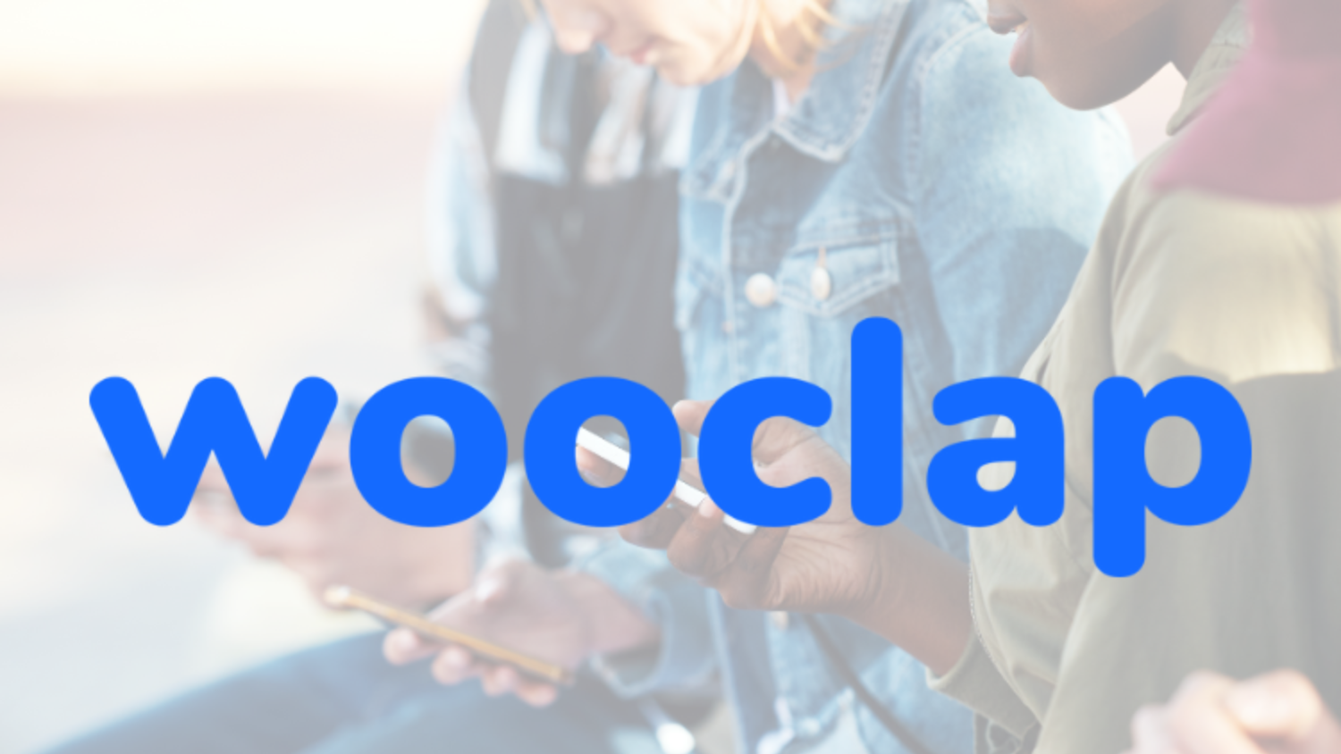 the word wooclap overlaid over students looking at their cellphones